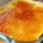 Crème brûlée in a Pyrex dish with caramelized sugar crust