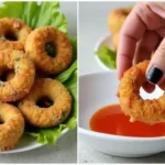 A plate of crispy, golden-brown fried donut rings with a person dipping one into a spicy sauce. Crispy Chicken and Potato Doughnuts