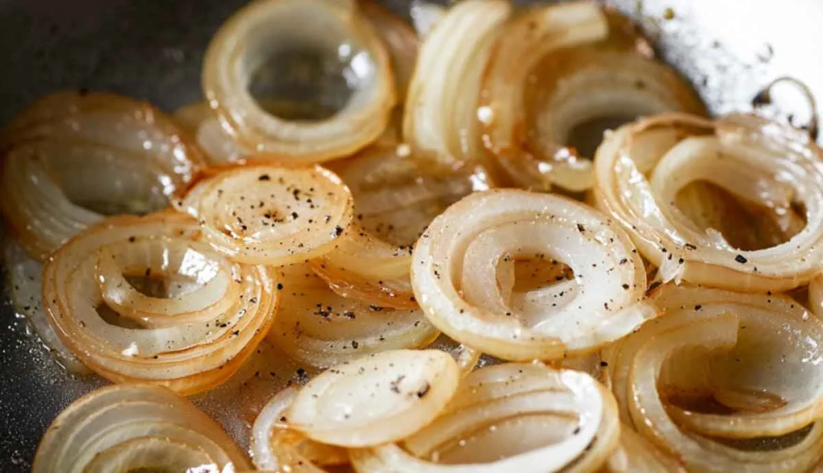 Onions caramelizing in butter for savory rice