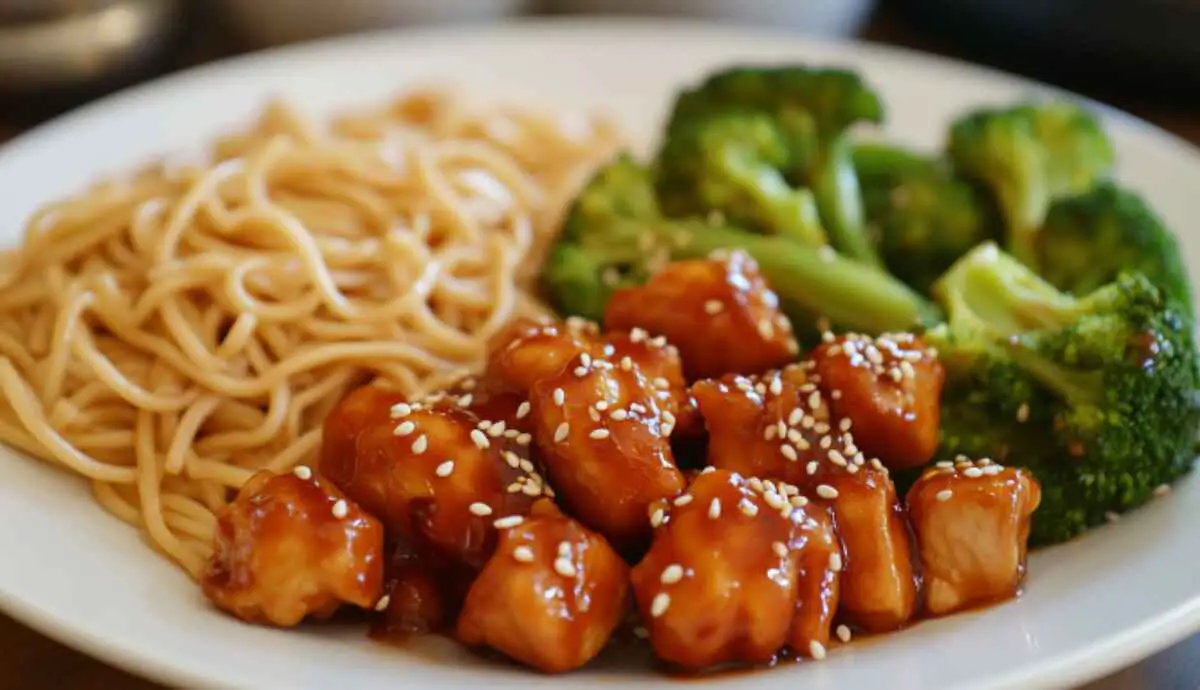 Sweet chili chicken served with sesame noodles and vegetables